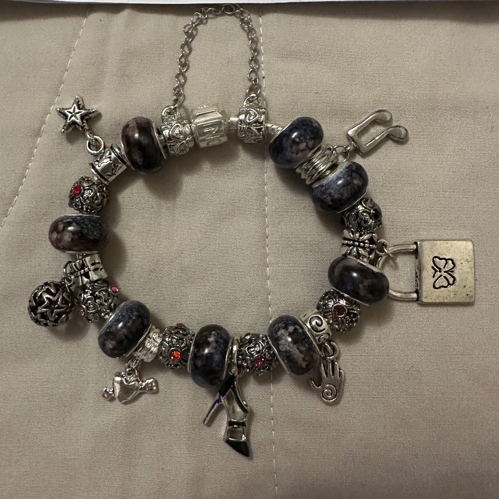 Handmade-NWOT-925 SS Plated charm bracelet. Black lampwork beads. Variety charms